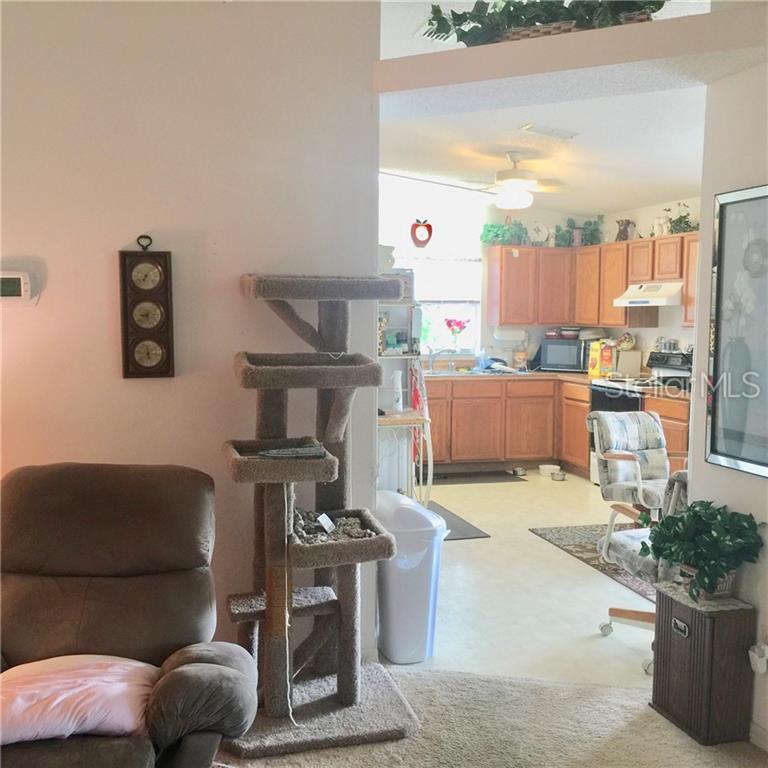 LOOKING FROM GREAT ROOM INTO KITCHEN