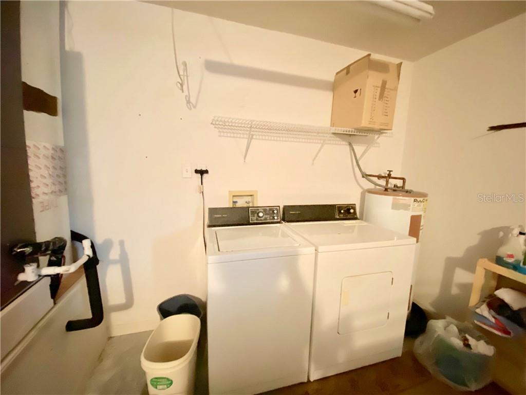 LAUNDRY ROOM INCLUDING A SINK IN GARAGE
