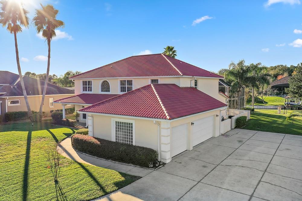 3 Car Garage and Oversized Circular Driveway with Huge additional parking pad!