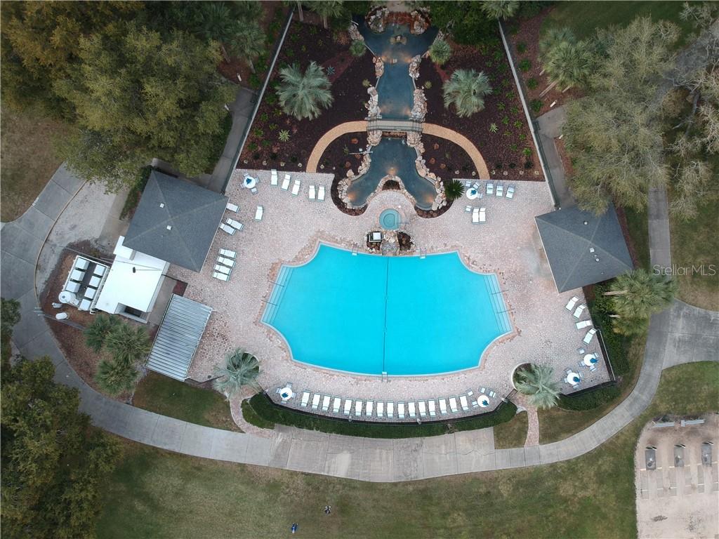 MANOR POOL, HOT TUB, AND WATER FALL POND AND BRIDGE (ONE OF THREE POOL AREAS)