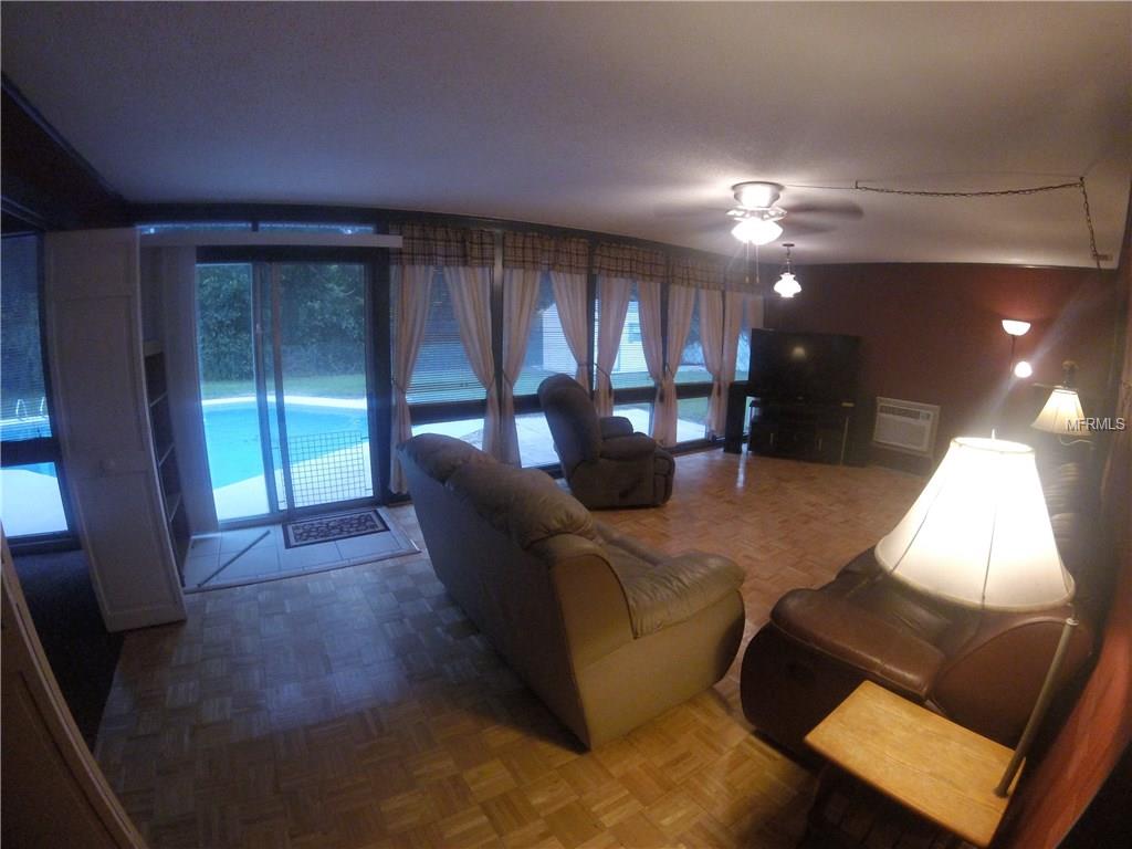 LARGE FAMILY ROOM WITH GREAT VIEWS OF POOL
