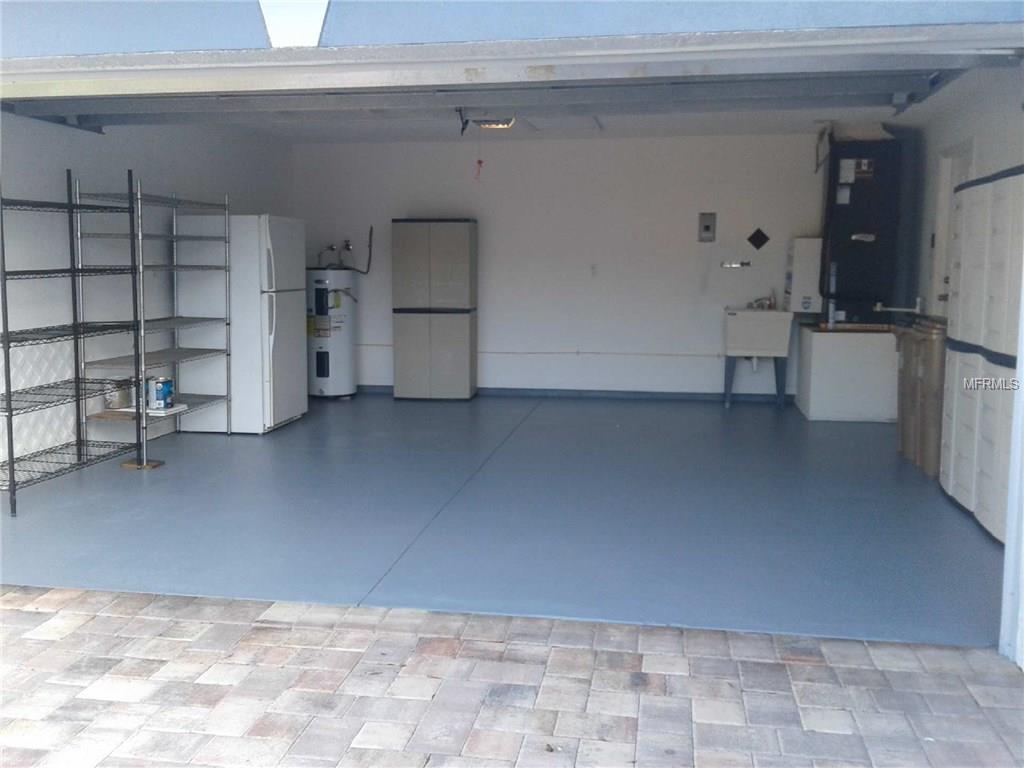 NEWLY PAINTED GARAGE FLOOR, RIGHT SIDEWALK, AND REAR PATIO