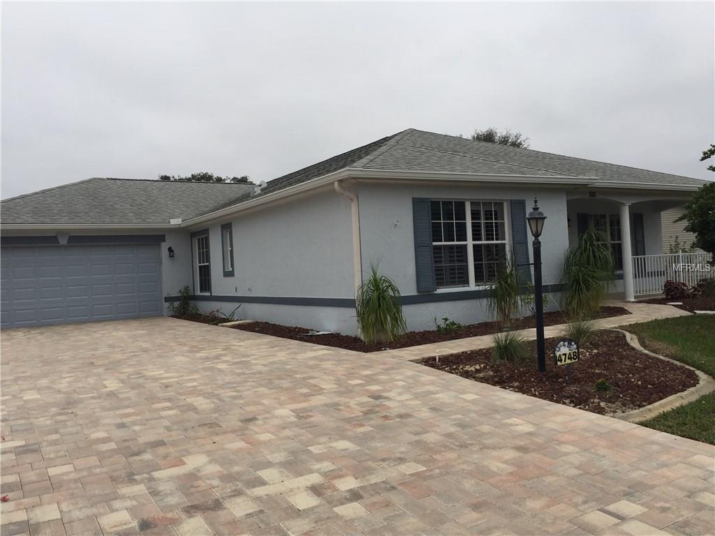 EXTERIOR FRONT WITH PAVERS AND CURBING