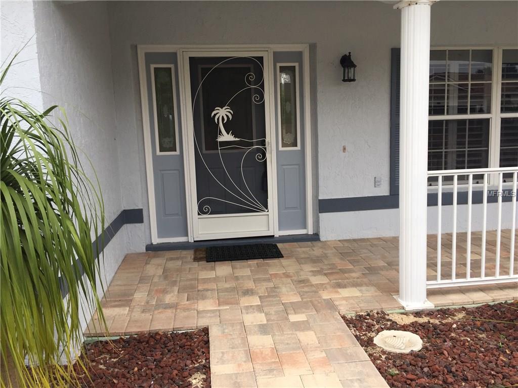 BEAUTIFUL ENTRANCE WITH TWO SIDELIGHTS AND FRONT PORCH PAVERS