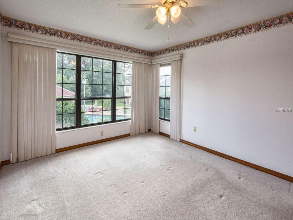 Large Master Suite with vertical blinds - enjoy the view or the darkness.