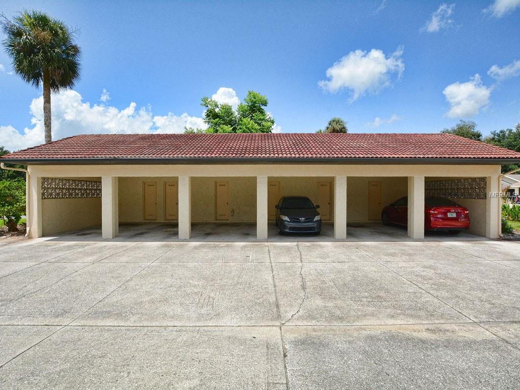 Open garage space with secure storage locker.