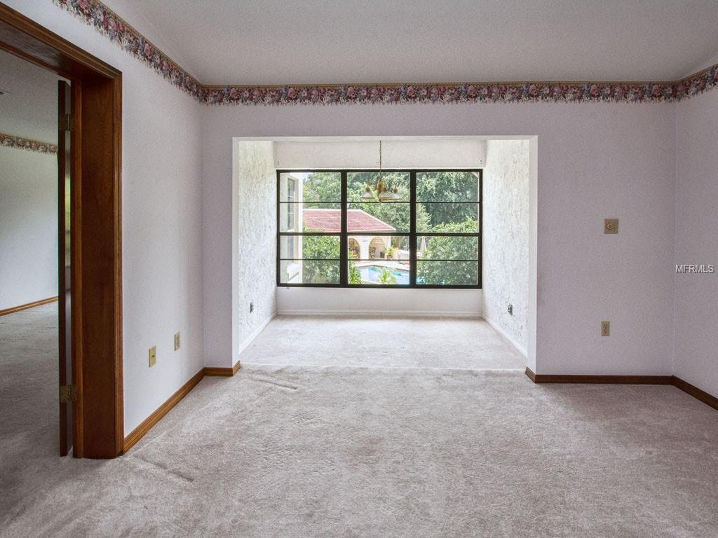 Florida Room is a perfect place for morning coffee and newspaper.