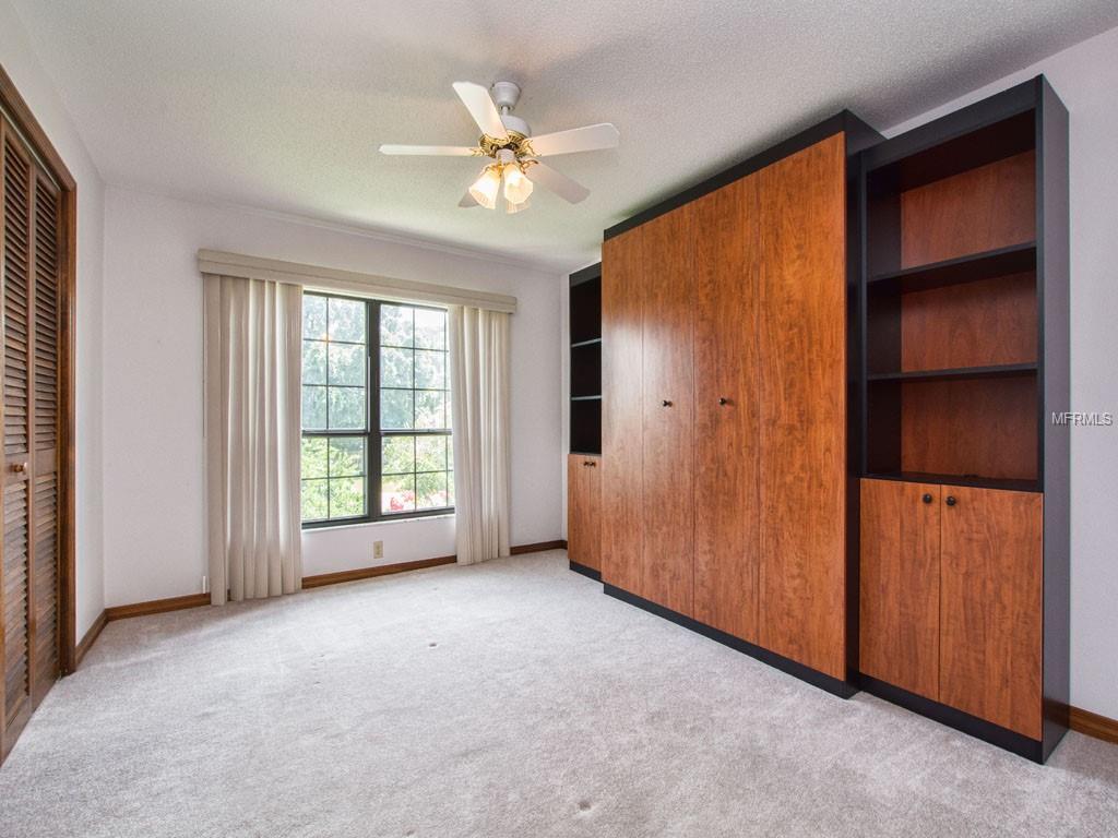 2nd Bedroom functions as an office or studio with Murphy Bed up.
