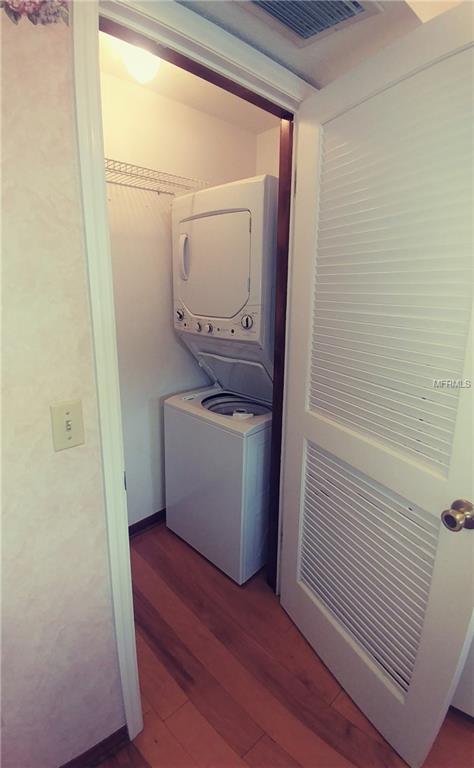 Convenient Washer/Drier next to Refrigerator.