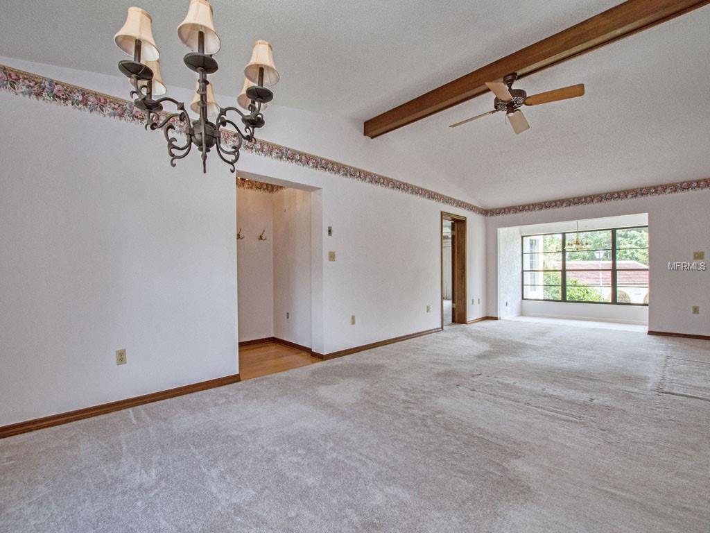 Entry Foyer center; Master Suite to right; bright Florida Room at the end.