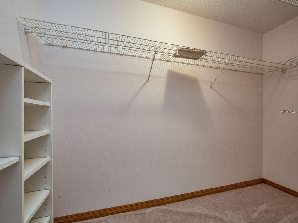 Built-in Shelving makes the Walk-in Closet even more useful.