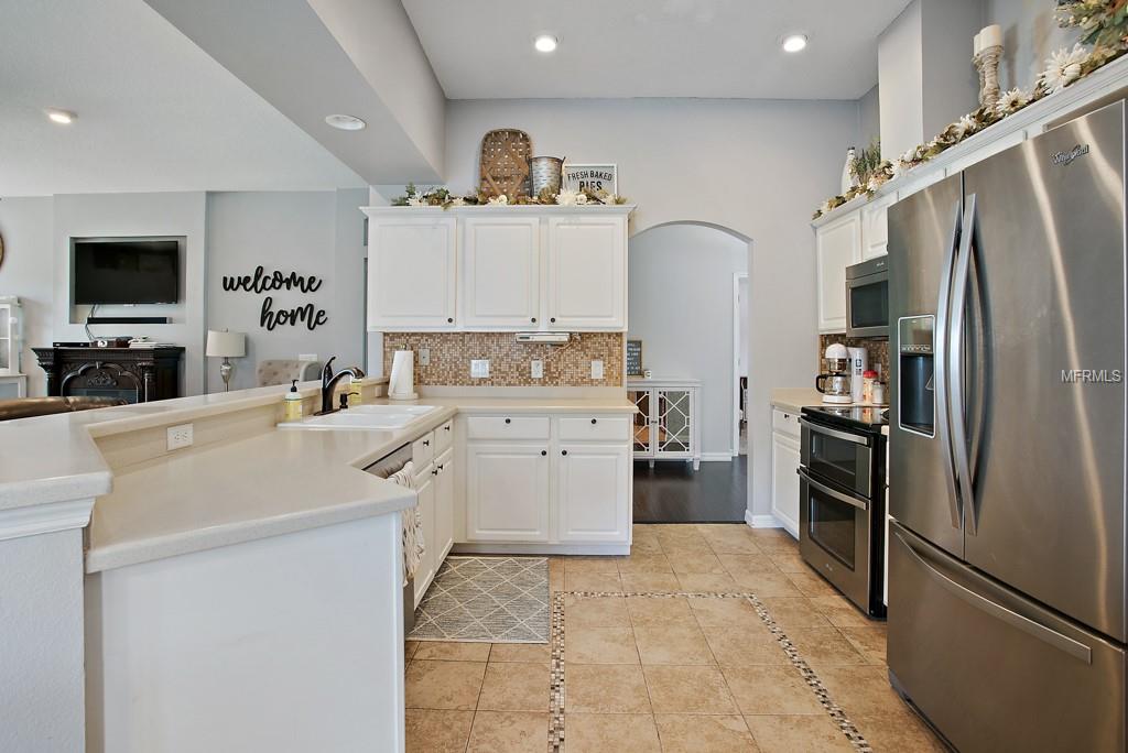 Upgraded flooring and backsplash