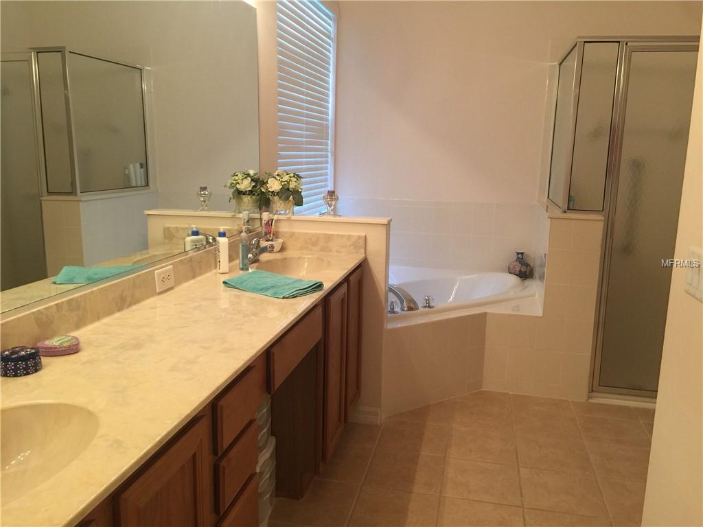 LARGE MASTER BATH WITH DOUBLE SINKS, GARDEN JETTED TUB, AND SEPARATE SHOWER