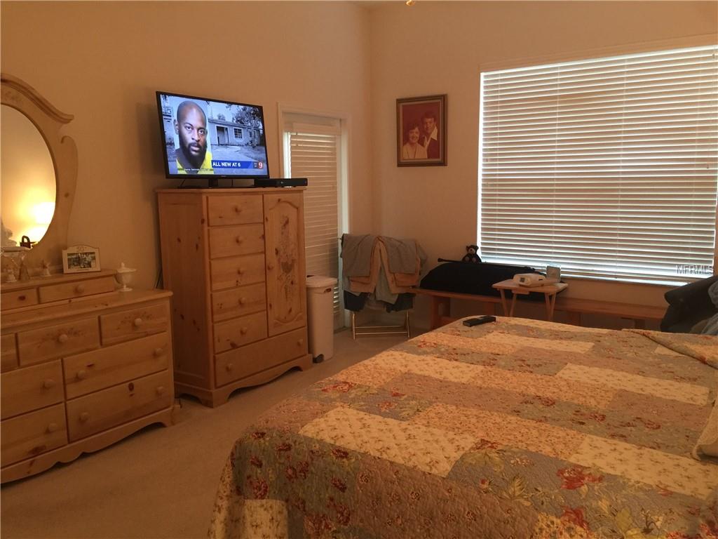 NOTICE THE FRENCH GARDEN DOOR TO THE LANAI FROM THE MASTER BEDROOM