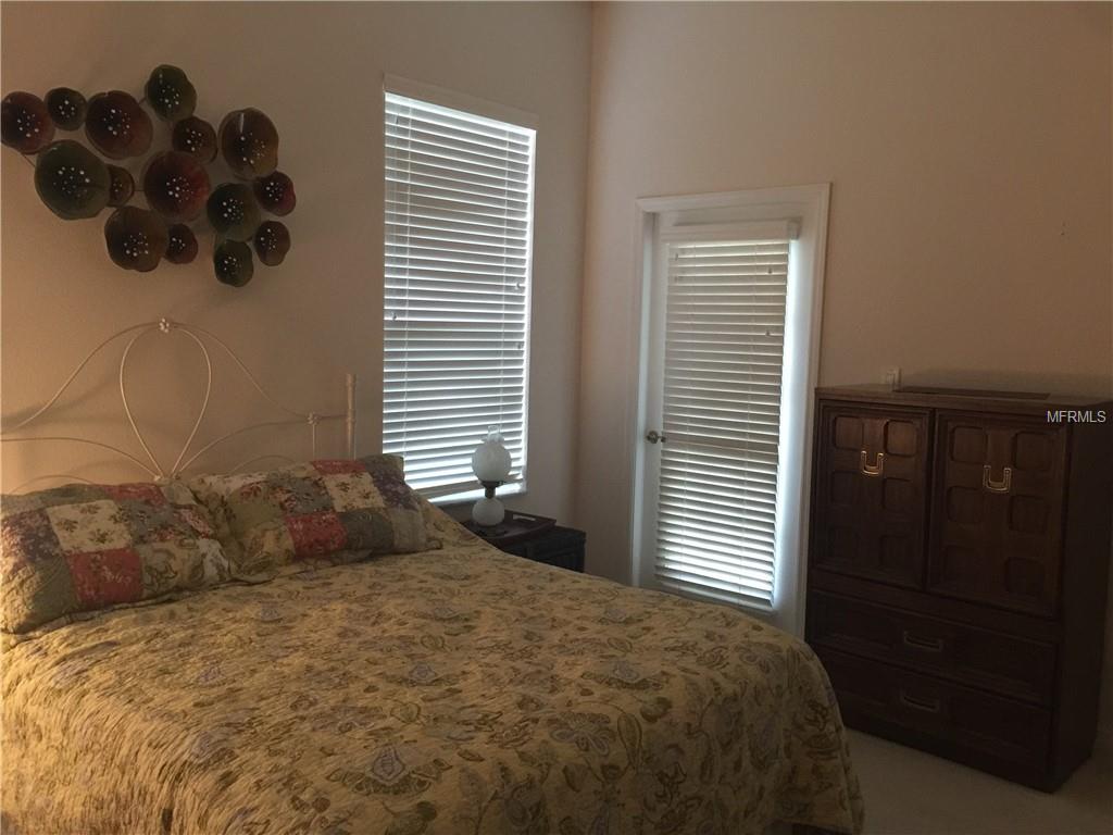 LARGE 2ND BEDROOM COULD DOUBLE AS A SECOND MASTER WITH FRENCH GARDEN DOOR LEADING TO THE LANAI
