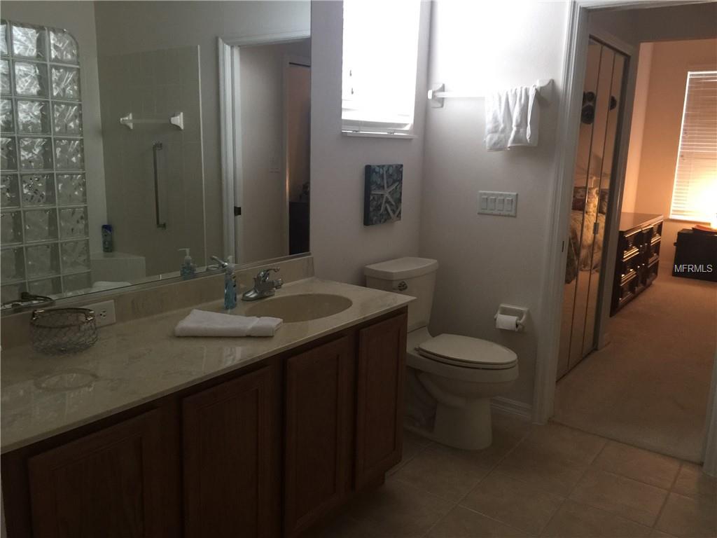 JACK AND JILL BATH FROM 2ND BEDROOM TO THE LIVING ROOM PLUS EASY ACCESS TO DEN/OFFICE