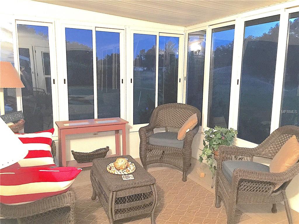 LARGE LANAI WITH GLASS WINDOWS