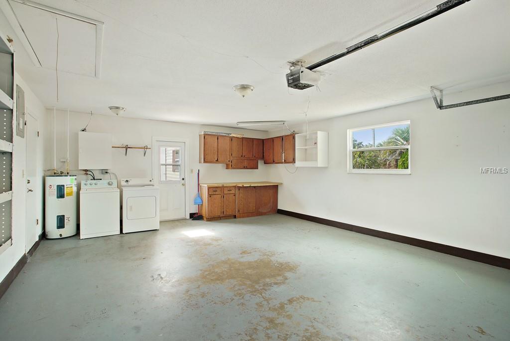 Garage with door to back yard