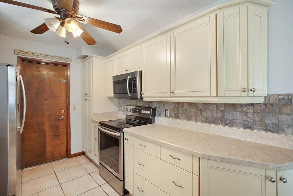 Kitchen with door to garage