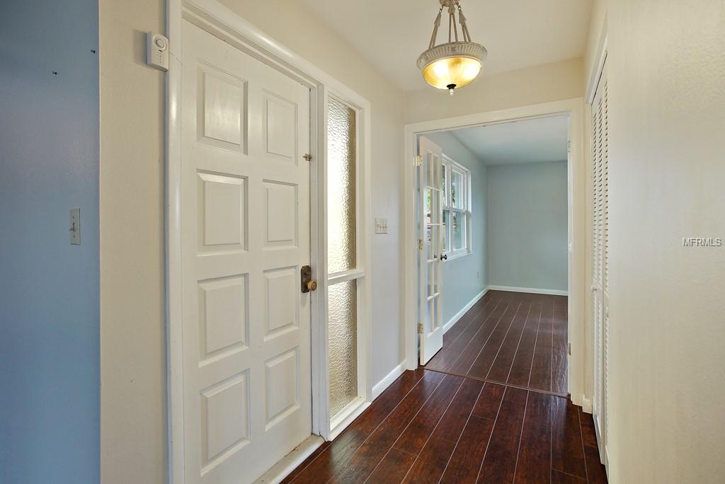 Foyer with large storage closet