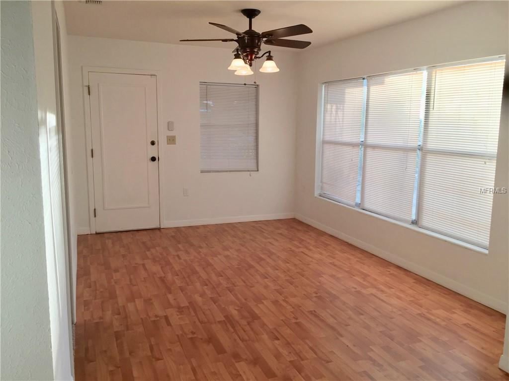 DEN/FAMILY ROOM WITH ENTRANCE FROM CARPORT