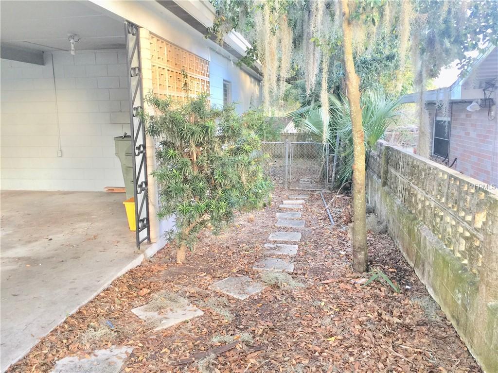 INVITING PAVER WALKWAY TO BACK YARD