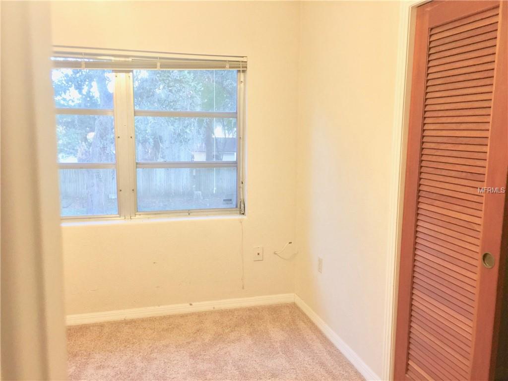 SECOND BEDROOM WITH NEW CARPETING