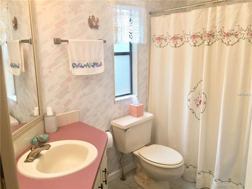 LOTS OF NATURAL LIGHTING IN BATHROOM