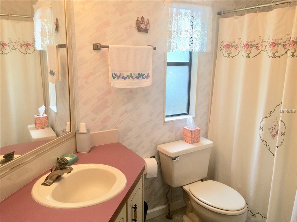 SECOND BATHROOM OPENS INTO BEDROOM AND HALLWAY