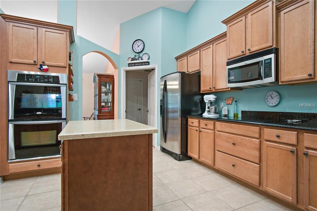 A COOK'S DELIGHT KITCHEN WITH STAGGERED CABINETS