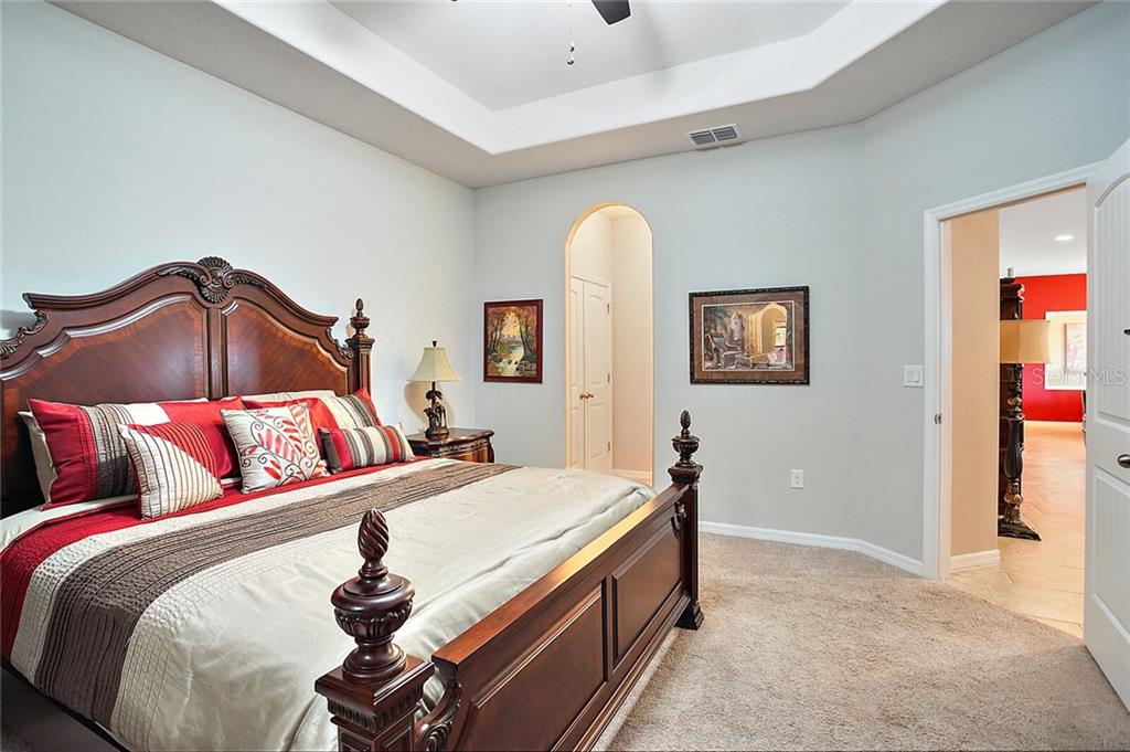 Arched doorway provides access to the two closets and En-Suite Master Bath.