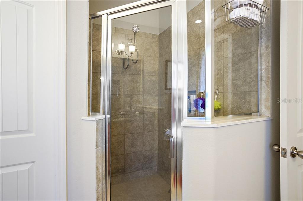 Spacious tiled shower on Master En-Suite and a separate toilet/water closet.