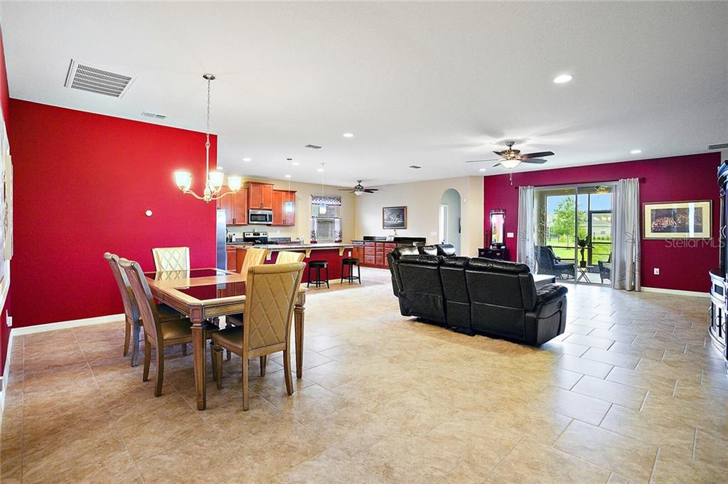 Walk into the fully tiled Great Room, a huge open space that encompass all the main living areas including the Family Room, Dining Room, Nook and Kitchen. Oh, and a view out-back, too!