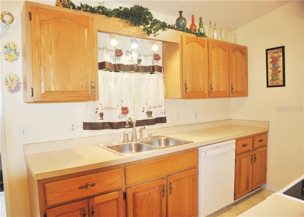 Notice the window opening up to the Lanai to serve refreshments or hand-out snacks or prep for the BBQ!