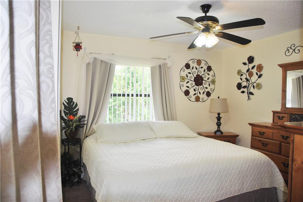 Master windows look out on the beautiful mature trees in the back-yard.