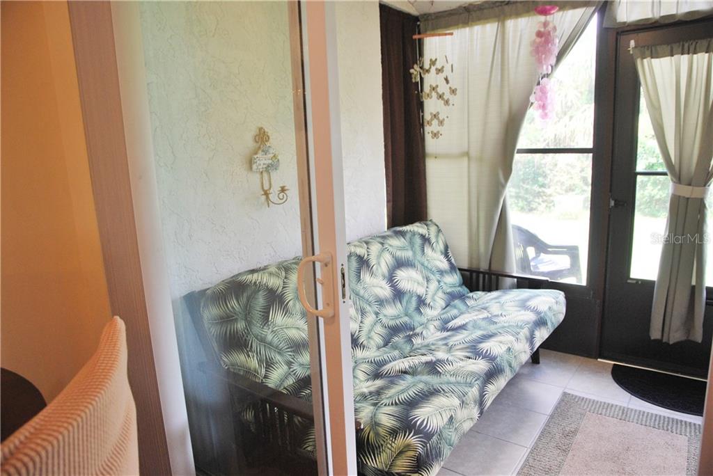 Exit from Dining to completely enclosed Lanai.