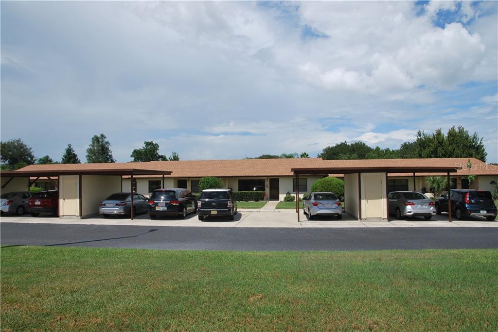 Very close access from your assigned covered Carport to your front door.