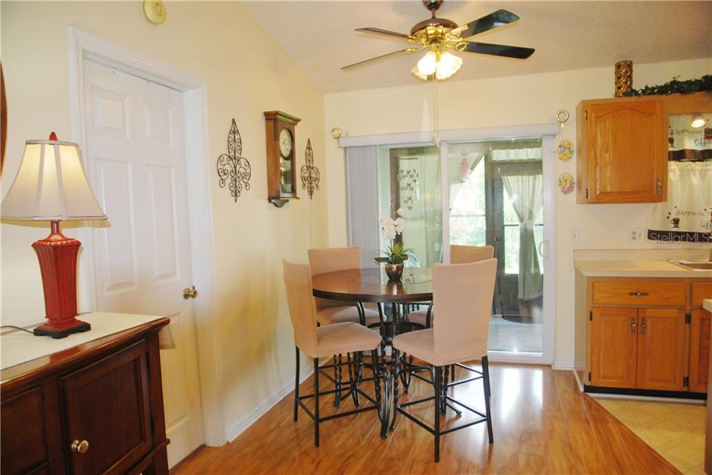 Dining Room adjacent to Kitchen and open to enclosed Lanai.