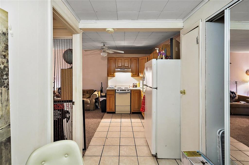 In Law Suite #1.  Under Main roofline, large lving area and bedroom, kitchenette and bathroom.