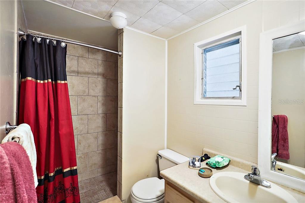In Law Suite #1, Bathroom with newer tiled shower