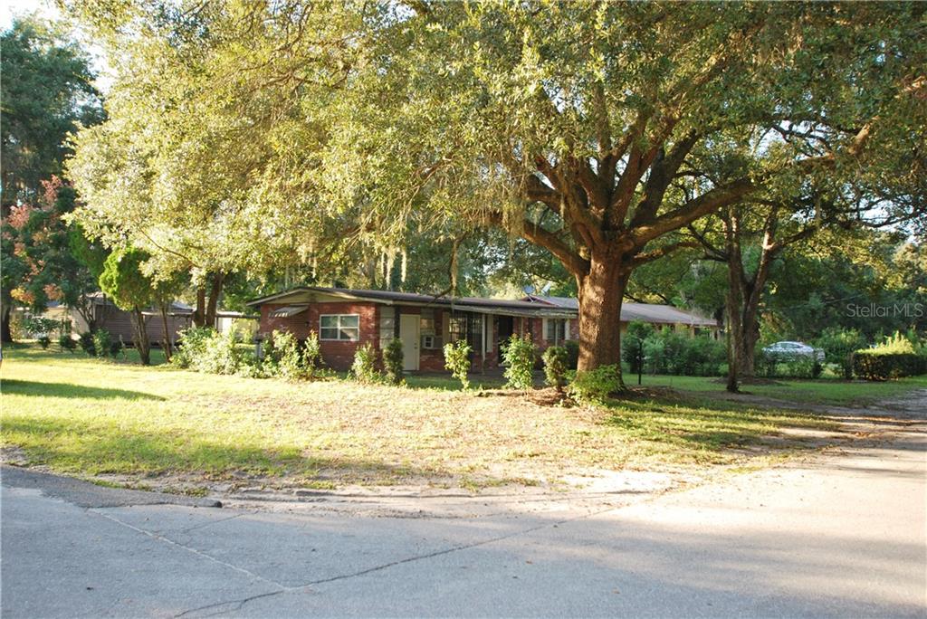 Bright yet shady massive corner lot.