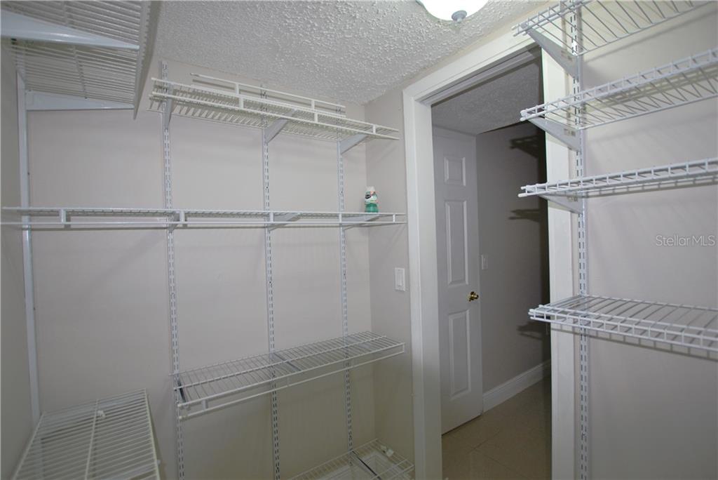 Do you think you have enough clothes and shoes to fill this Walk-in closet?