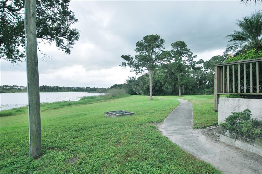 Walking trails around the lake. Breathe it in and enjoy Lake Lotus Club and lake-life!