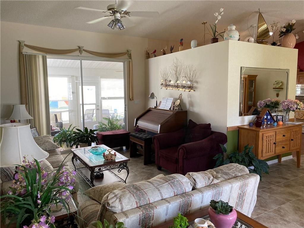 FROM THIS VIEW OF THE LIVING ROOM YOU CAN SEE THE DINING AREA