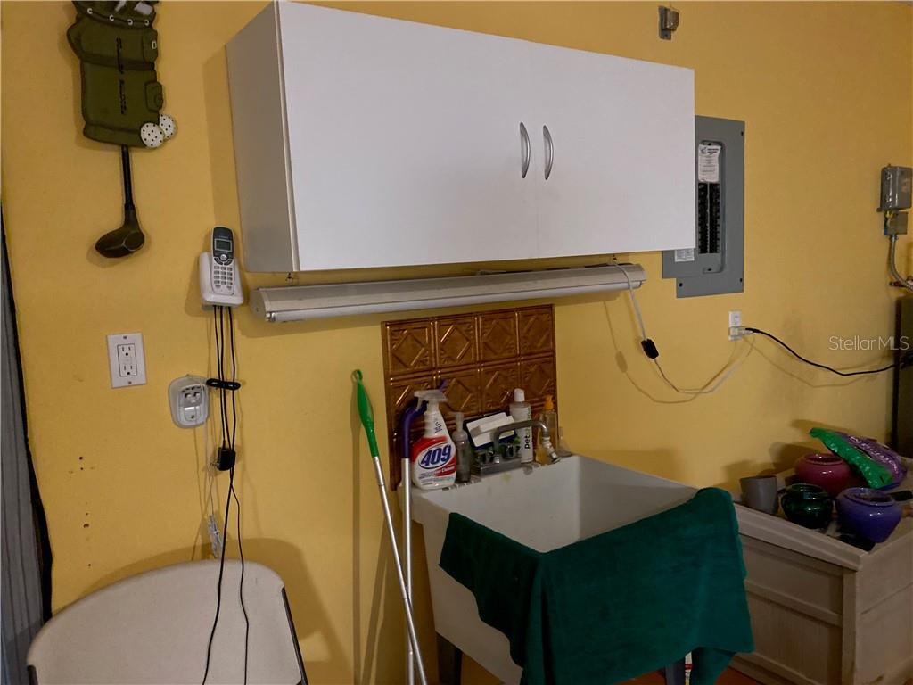 GARAGE IS COMPLETE WITH UTILITY SINK FOR EASY CLEANUP