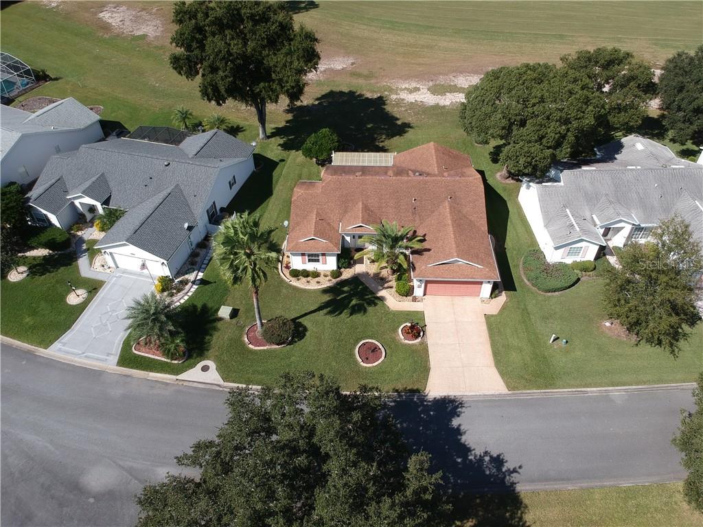 GOLF COURSE AT THE REAR OF THE HOME AND PARKLIKE SETTING ACROSS THE STREET IN THE FRONT