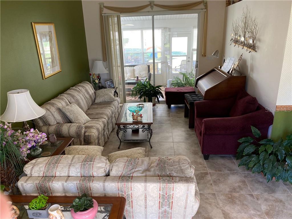 LIVING ROOM LOOKING INTO LANAI