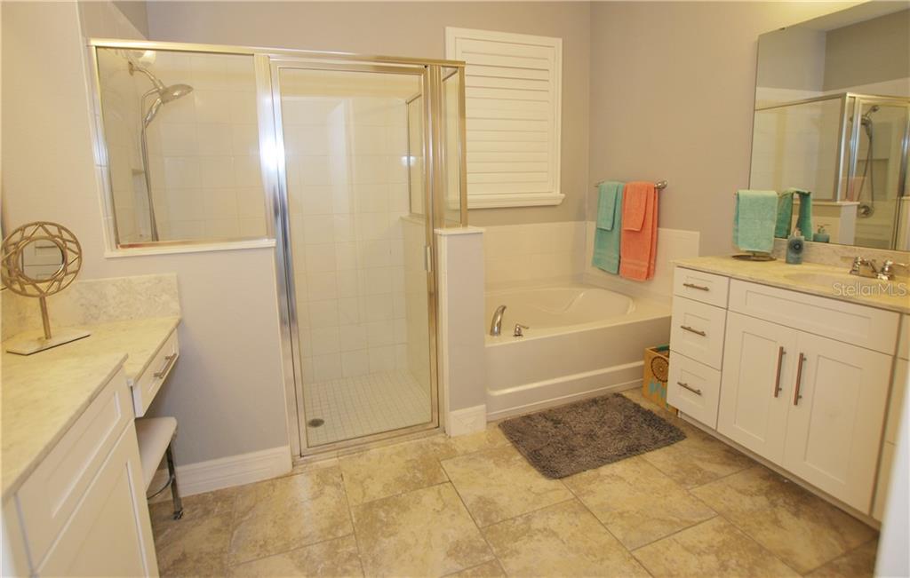 From a dreamy Master to your en-suite Bath with double vanities, a tub, and separate shower.