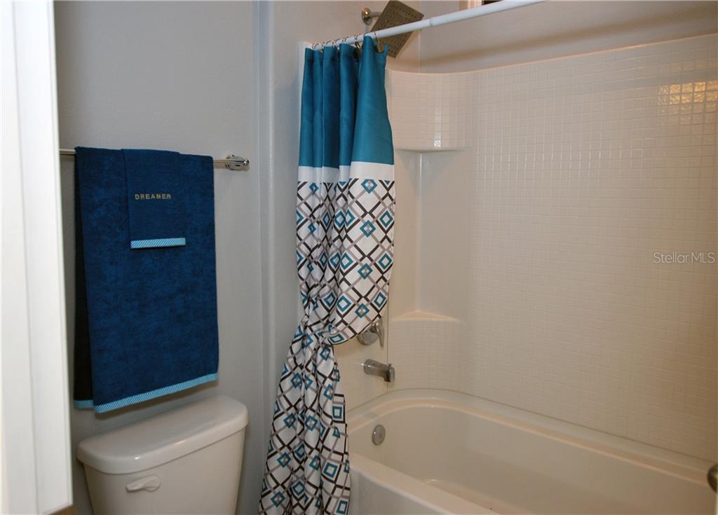 Jack and Jill Bathroom has a separate tub and toilet.