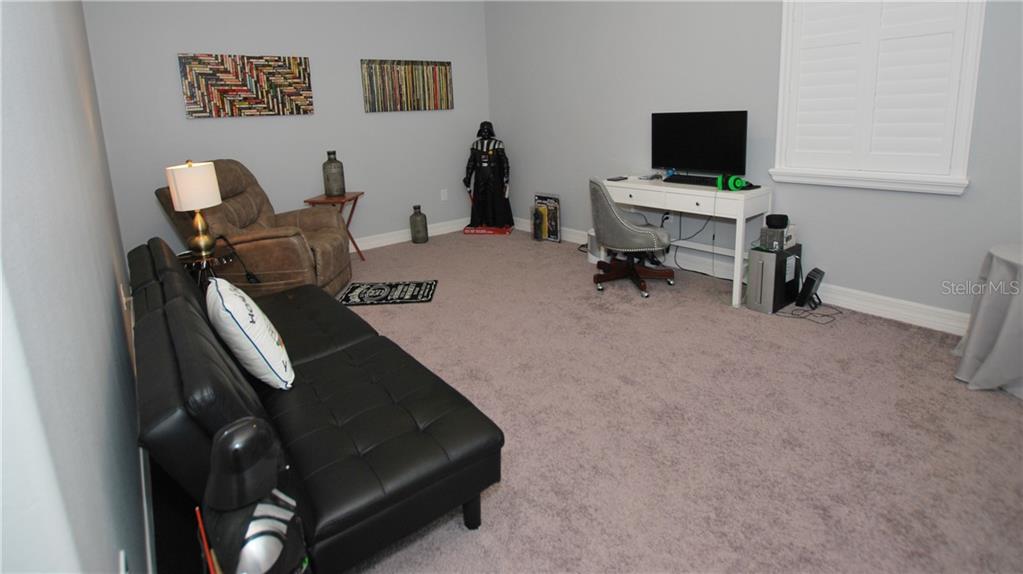 The bonus den/loft/flex room is perfect for a game room, pool table, man cave, she-den, craft room, office, gym, or whatever you can imagine.